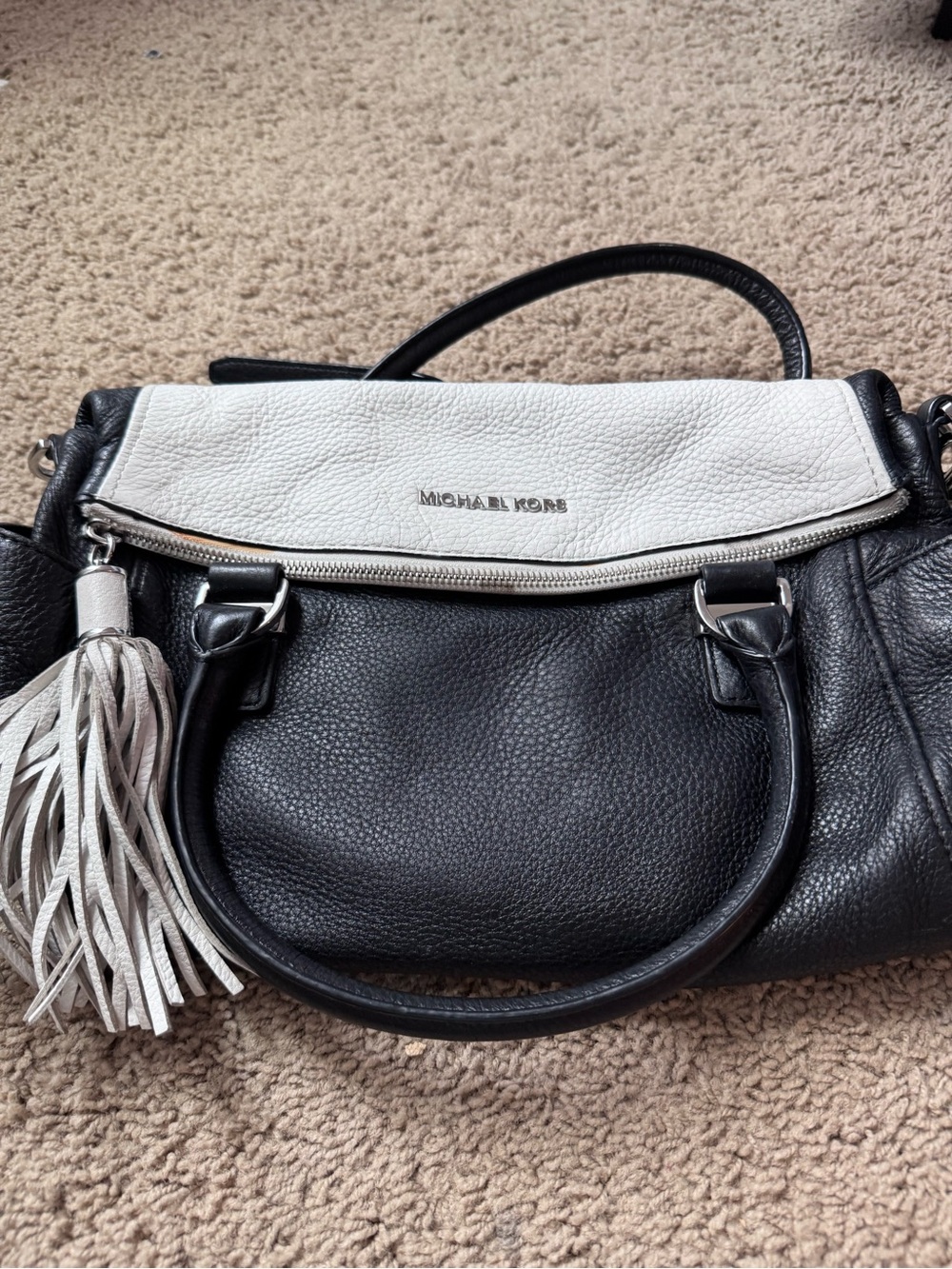 Michael Kors Black and White Leather Satchel with Tassel Accent